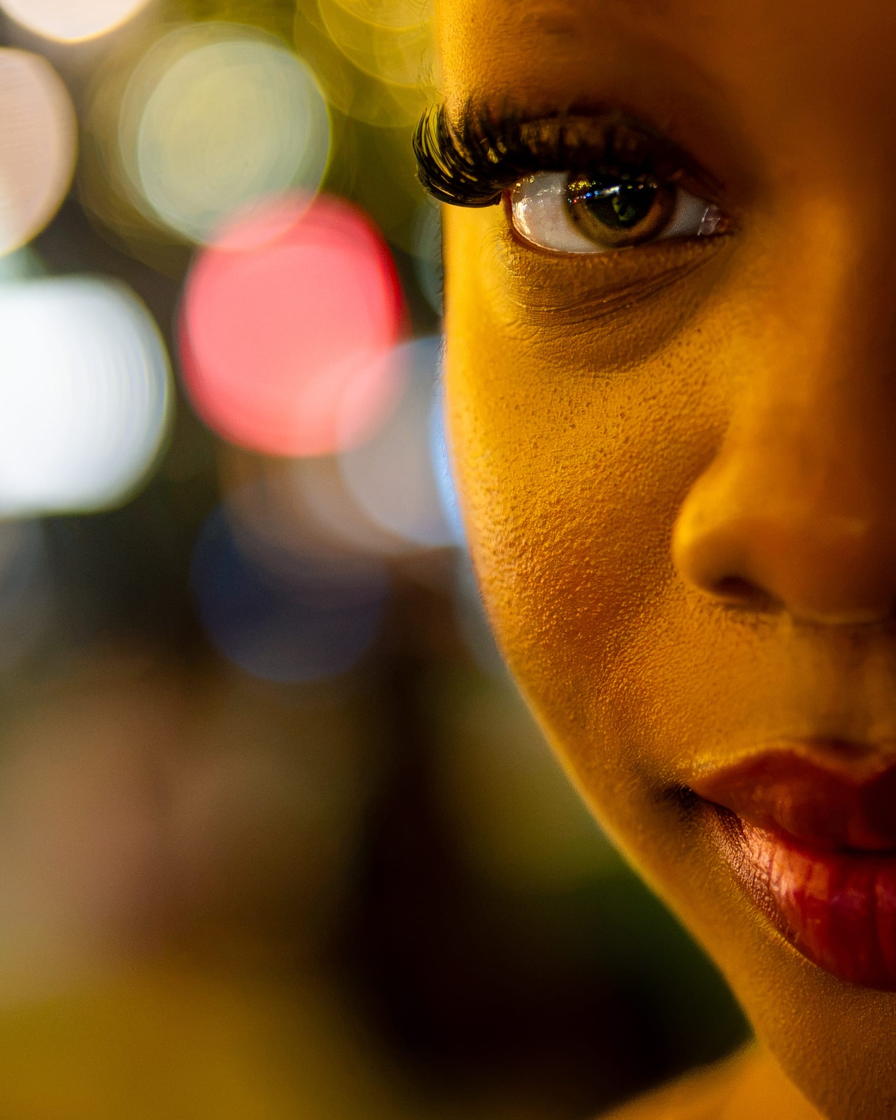 Model portfolio shoot on a downtown Austin street at night.